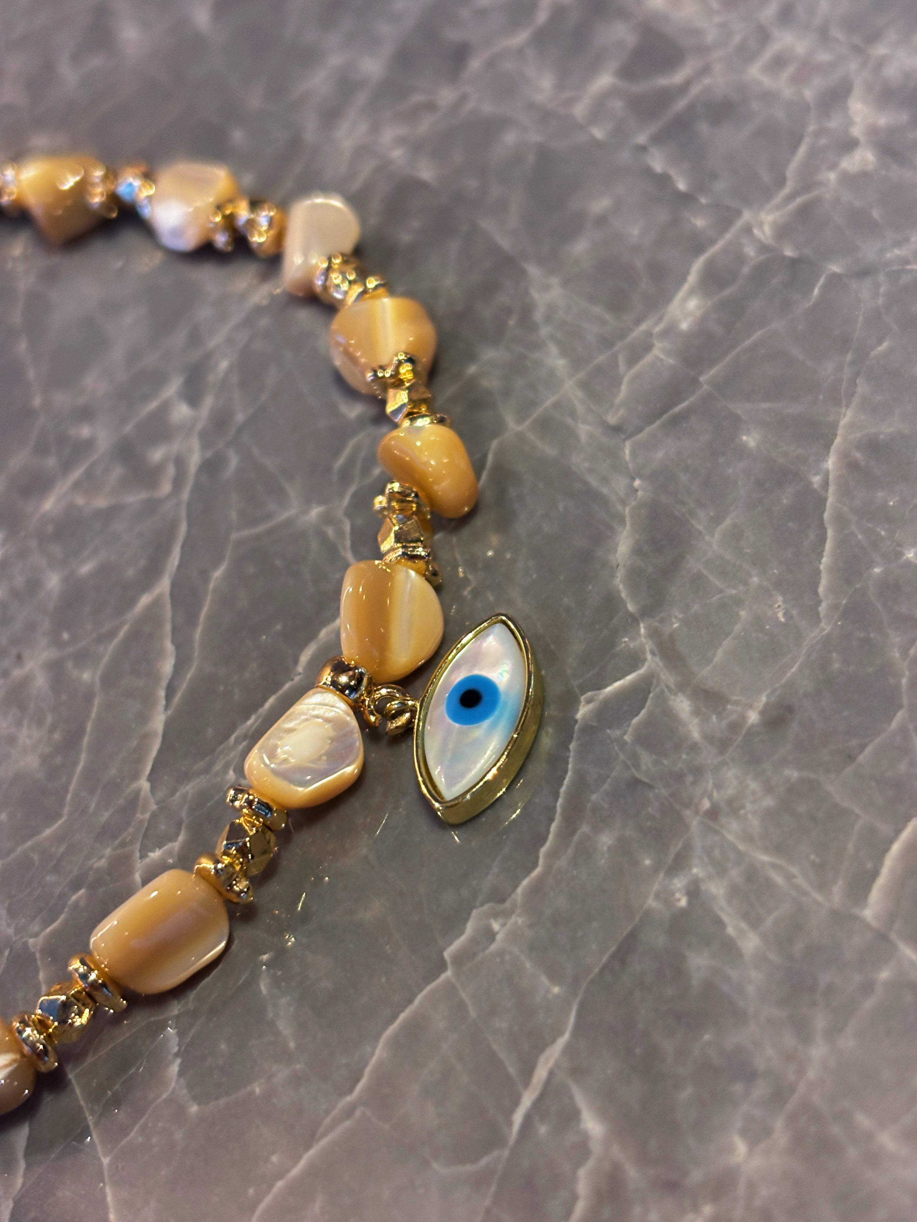 Sentinel Golden Shell Evil Eye Guardian Necklace