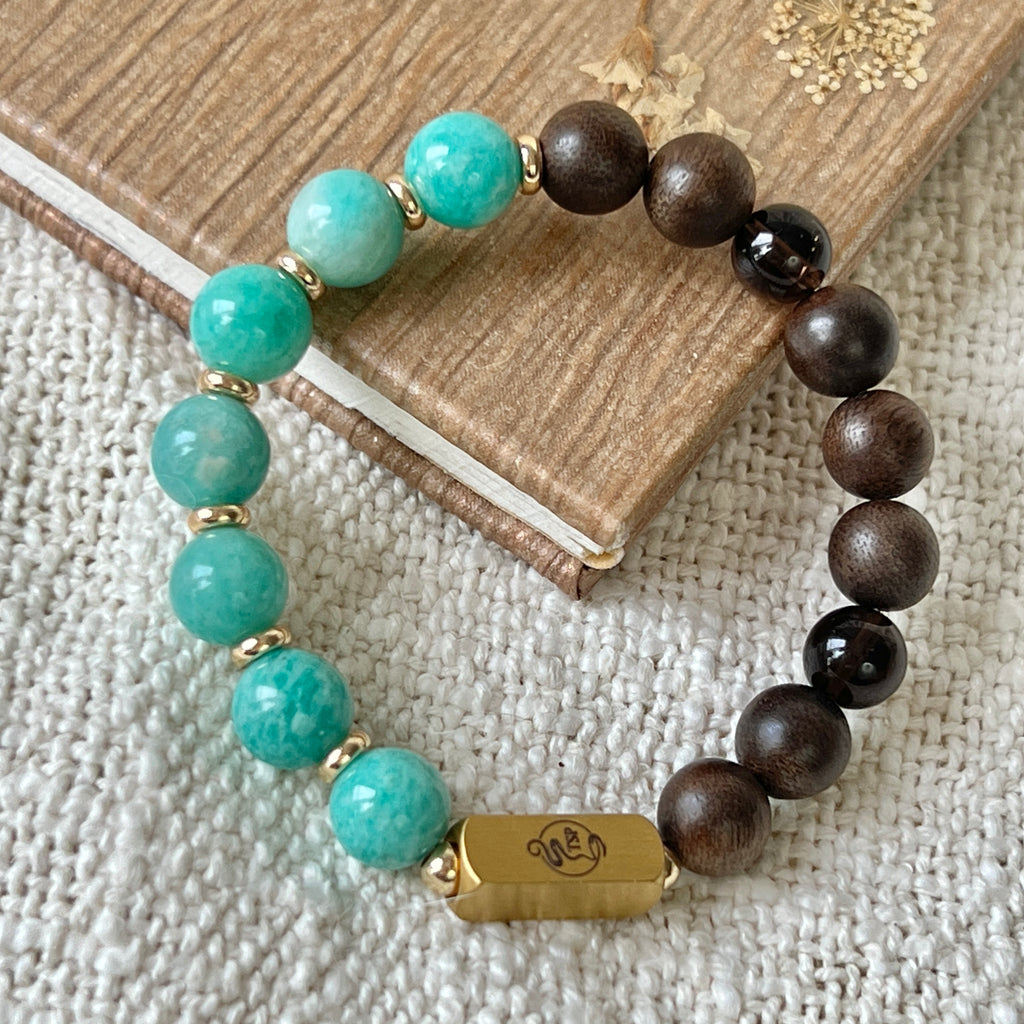 Thousand Buddhas’ Radiance Agarwood Larimar Wisdom Bracelet