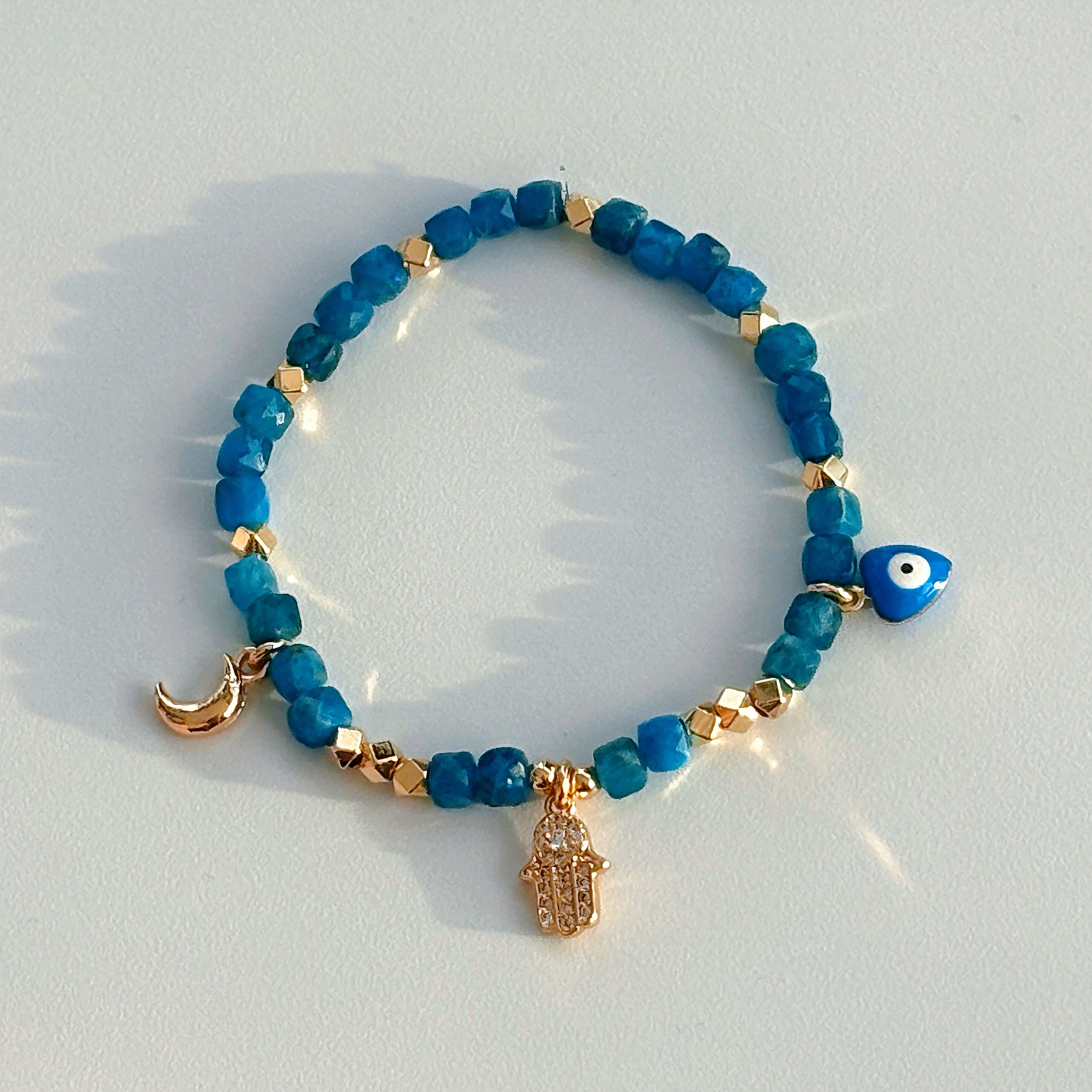 Magic Series Faceted Blue Apatite Evil Eye Hamsa Moon Bracelet