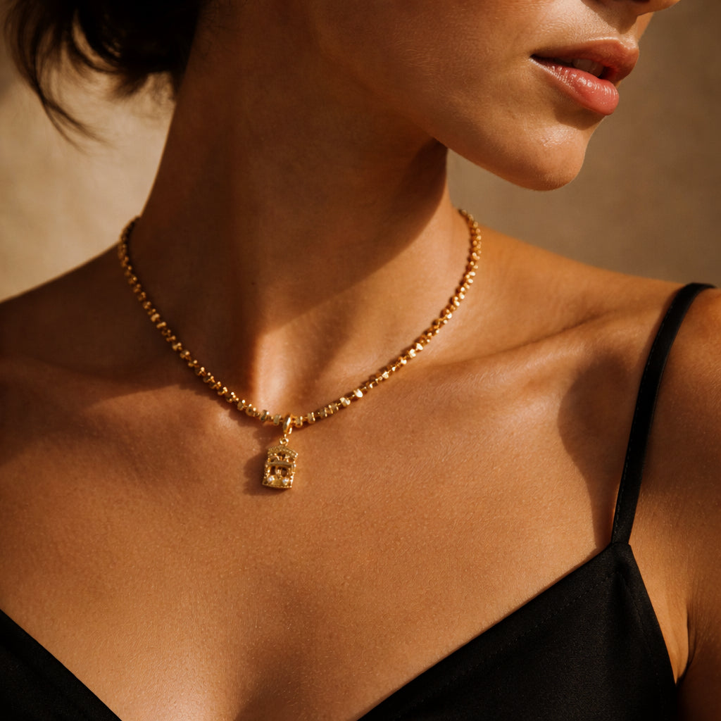 Luminous Gold Carousel Hematite Bead Necklace