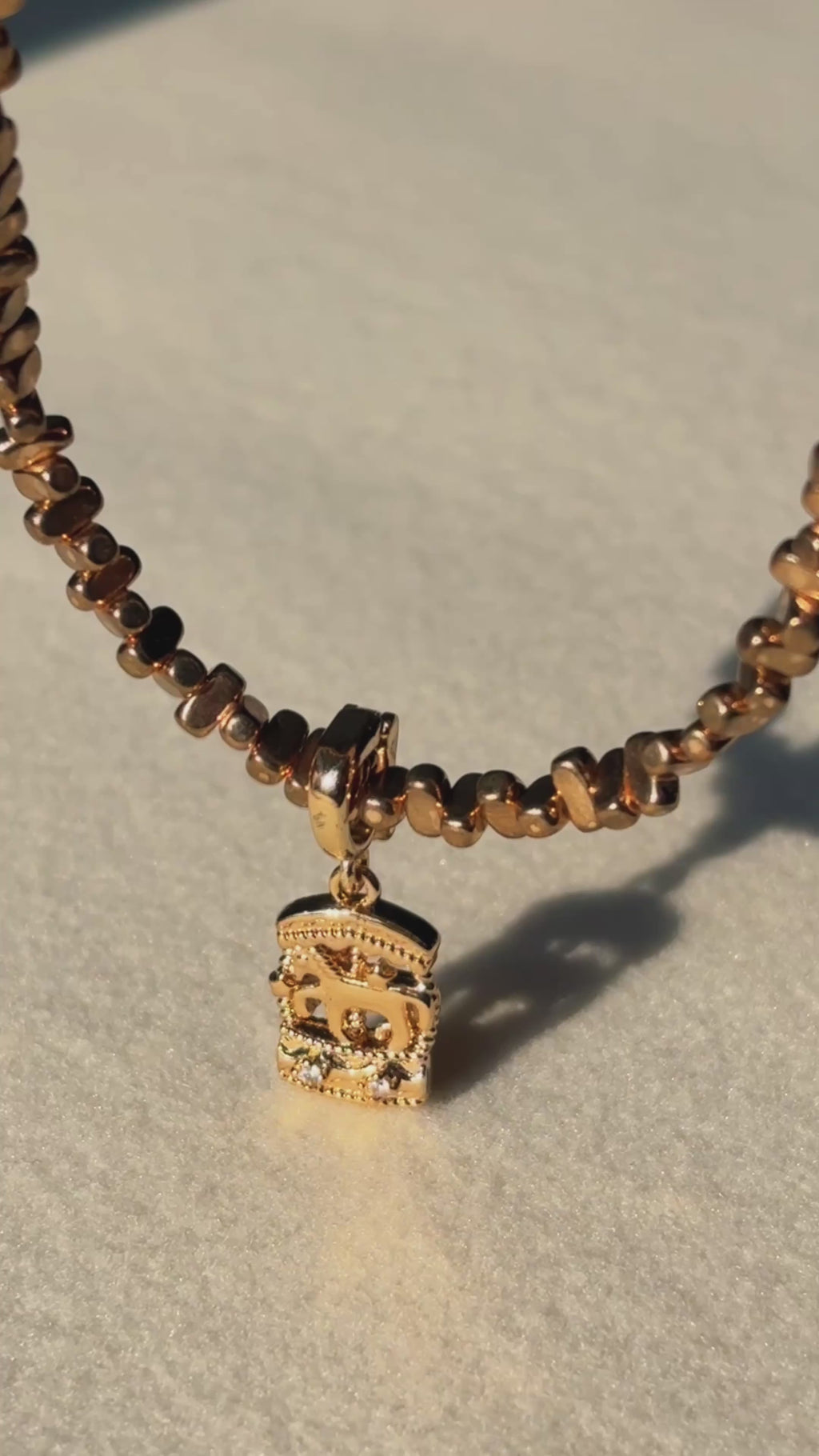 Luminous Gold Carousel Hematite Bead Necklace