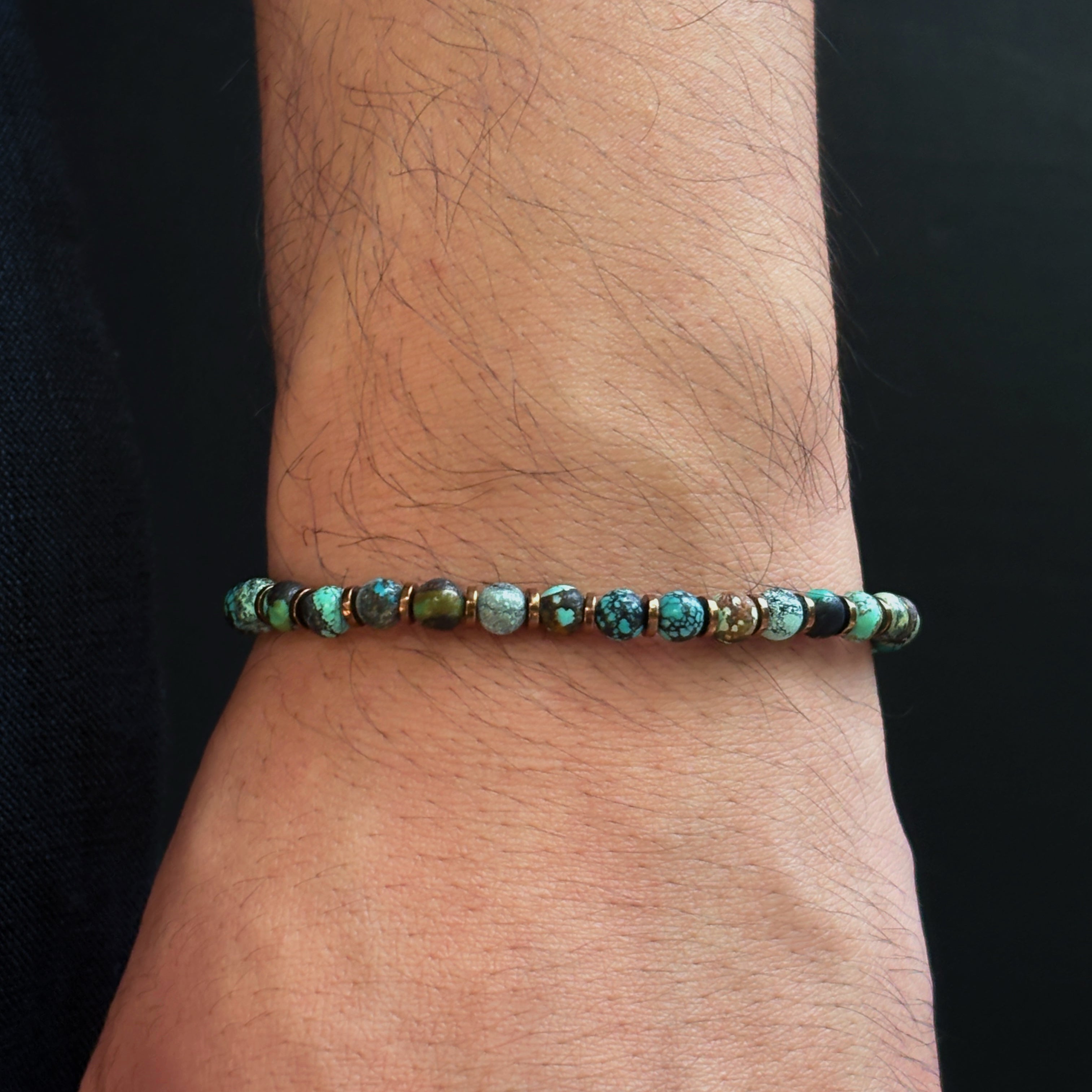 Turquoise Hematite Bracelet on Wrist Antique Bronze