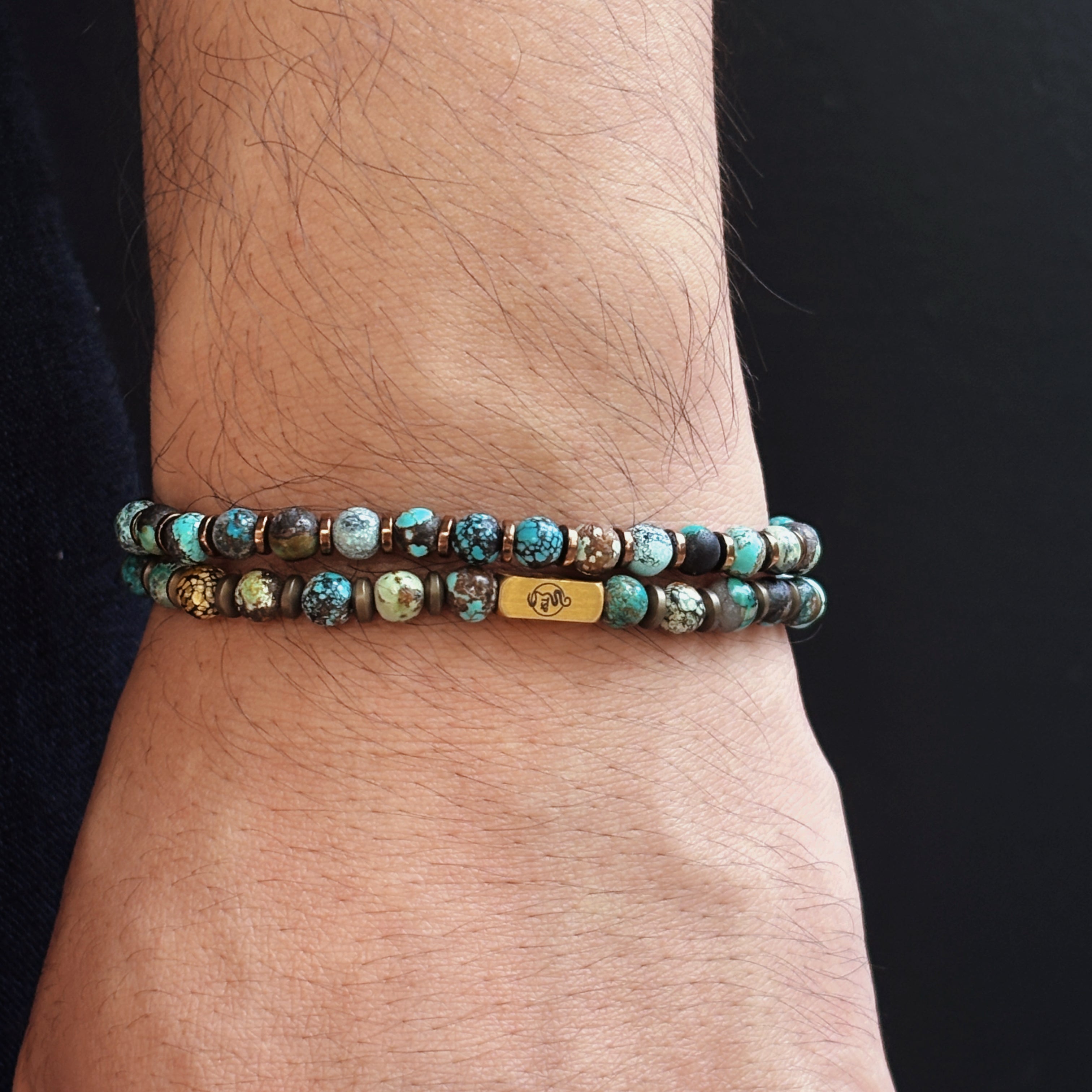 Turquoise Hematite Bracelets Stacked on Wrist